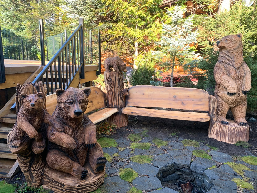 Carved bear corner seating installed on a stone patio